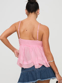 back view of model wearing Princess Polly Zephyra Top Pink Sleeveless Plunger 