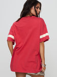 back view of model wearing Princess Polly New York 95 Oversized Tee Red Half Sleeves Crew Neck 