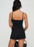 back view of model wearing Princess Polly Volley Skort Black High Waisted Shorts 