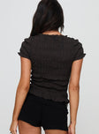 back view of model wearing Princess Polly Romelle Shirred Top Black / Brown Plaid Short Sleeves High Neck 