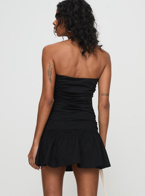 back view of model wearing Princess Polly Tamlyn Halter Mini Dress Black Asymmetric Neckline 
