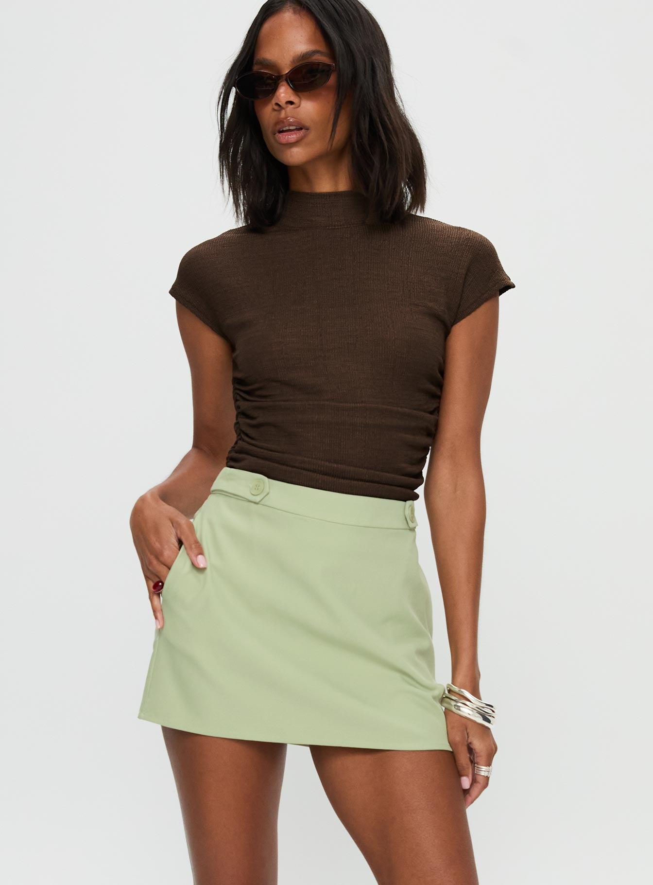   front view of model wearing Princess Polly Hosier Twill Mini Skirt Green 