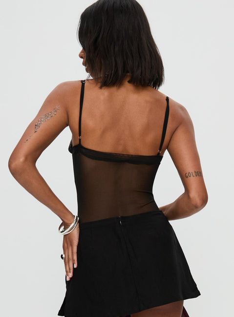back view of model wearing Princess Polly In The Club Bodysuit Black Sleeveless 