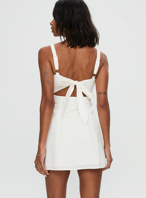 back view of model wearing Princess Polly Summer Isles Mini Dress White Sweetheart Neckline 