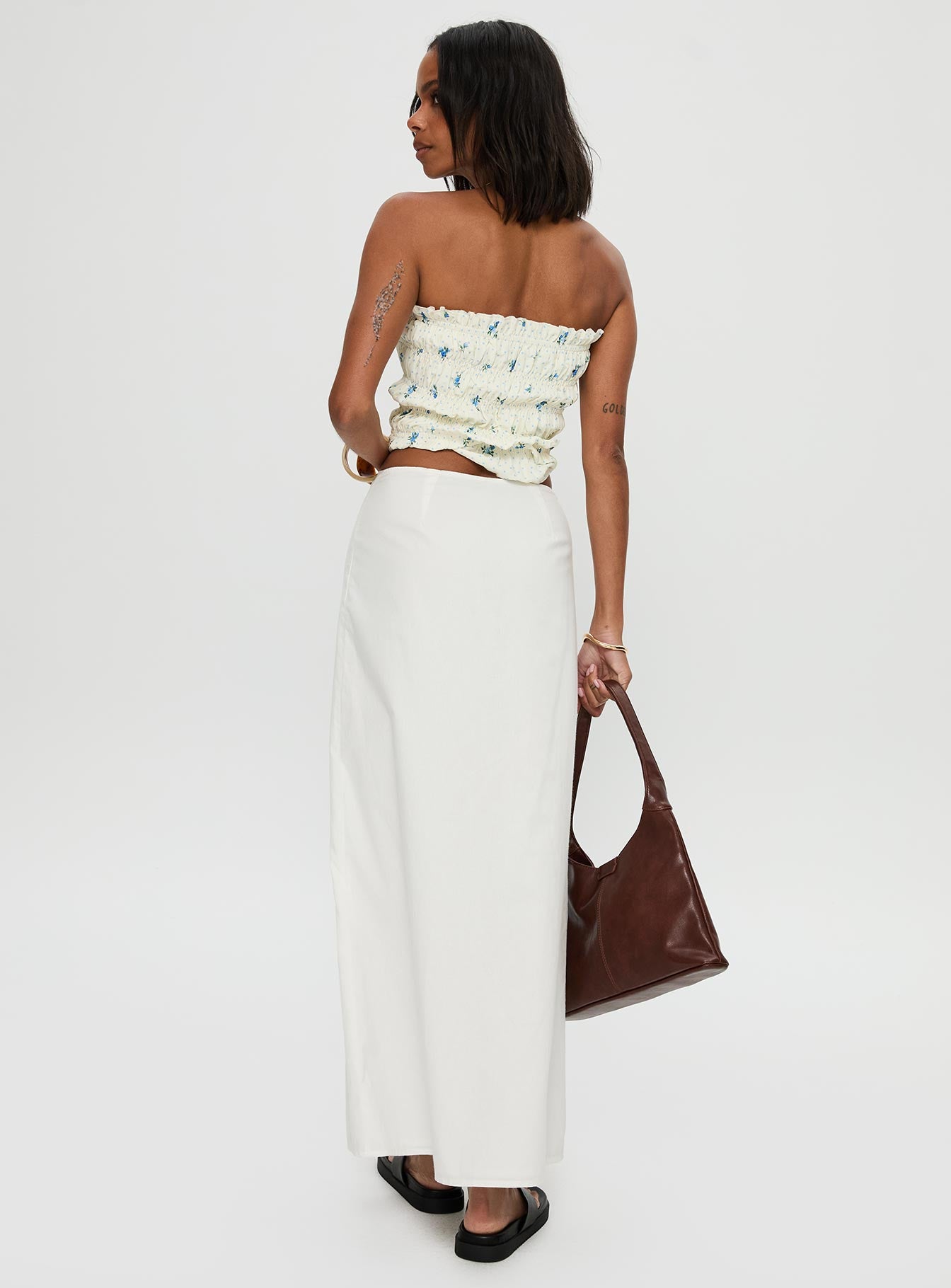 back view of model wearing Princess Polly Jasmira Maxi Skirt White Maxi 