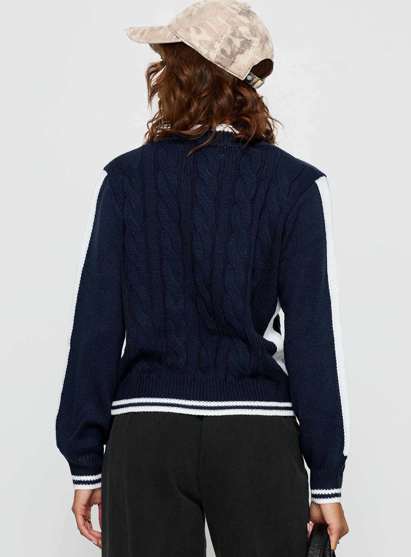 back view of model wearing Princess Polly Tevyn Cable Knit Zip Through Knit Sweater Blue / Cream Cropped Jumpers 