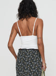 back view of model wearing Princess Polly Junia Top White Sleeveless V-Neck 