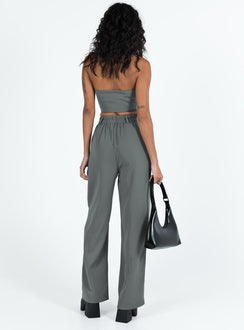 Matching set Vest top  Lapel collar  Button front fastening  High waisted pants  Zip and button fastening  Belt looped waist  Twin hip pockets  Elasticated back Wide leg 