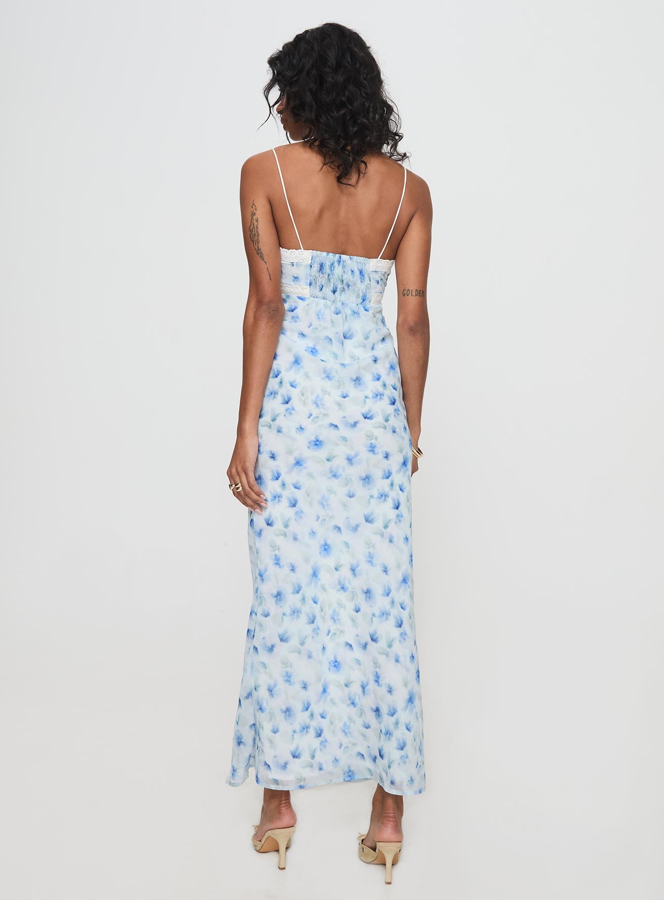 back view of model wearing Princess Polly Emily Maxi Dress Blue Floral V-Neck 