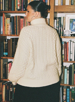 back view of model wearing Princess Polly Judson Roll Neck Cable Knit Sweater Cream Curve regular 