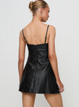 back view of model wearing Princess Polly Isak Woven Faux Leather Mini Dress Black Square Neck 