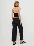 back view of model wearing Princess Polly Beach House Pants Black Low Rise Pants 