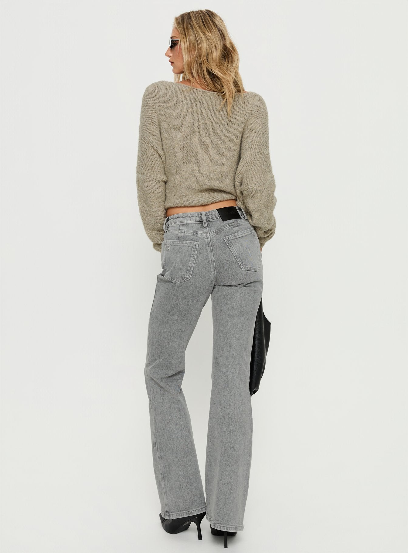 back view of model wearing Princess Polly Magic Mirror Mid Rise Bootleg Jeans Washed Grey Mid Rise Jeans 