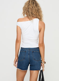 back view of model wearing Princess Polly Xena Denim Shorts Mid Blue Wash High Waisted Shorts 