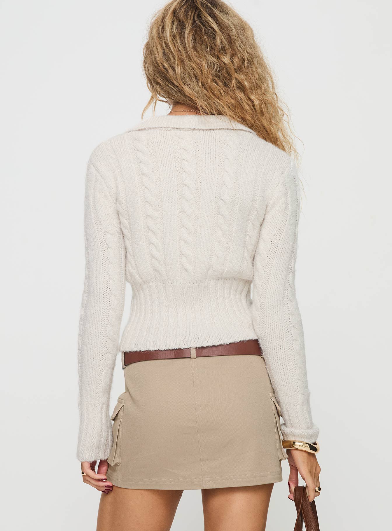 back view of model wearing Princess Polly Jeller Zip Front Knit Sweater Beige Cropped 