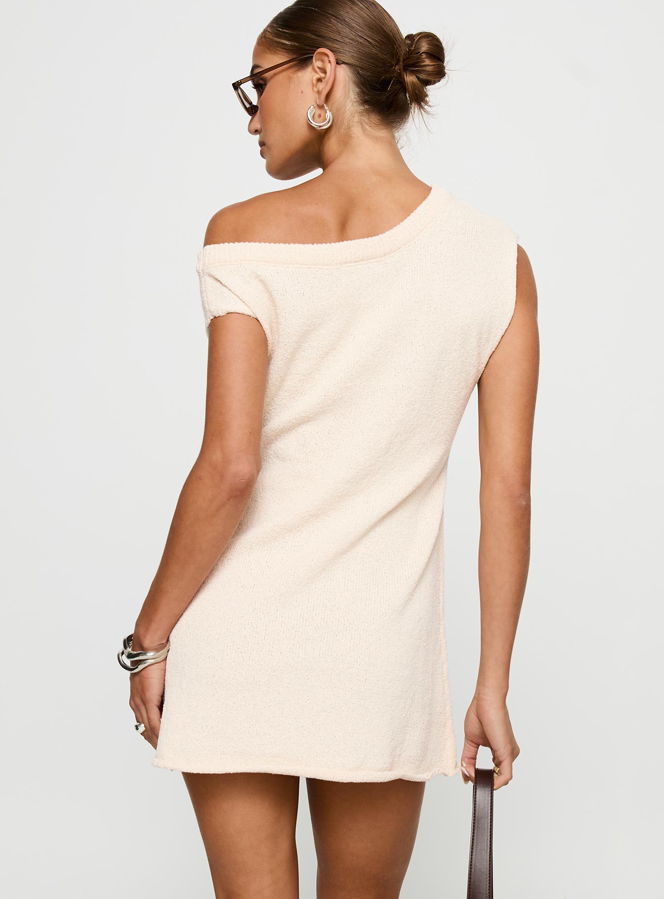back view of model wearing Princess Polly Liberation Off The Shoulder Mini Dress White Asymmetric Neckline 