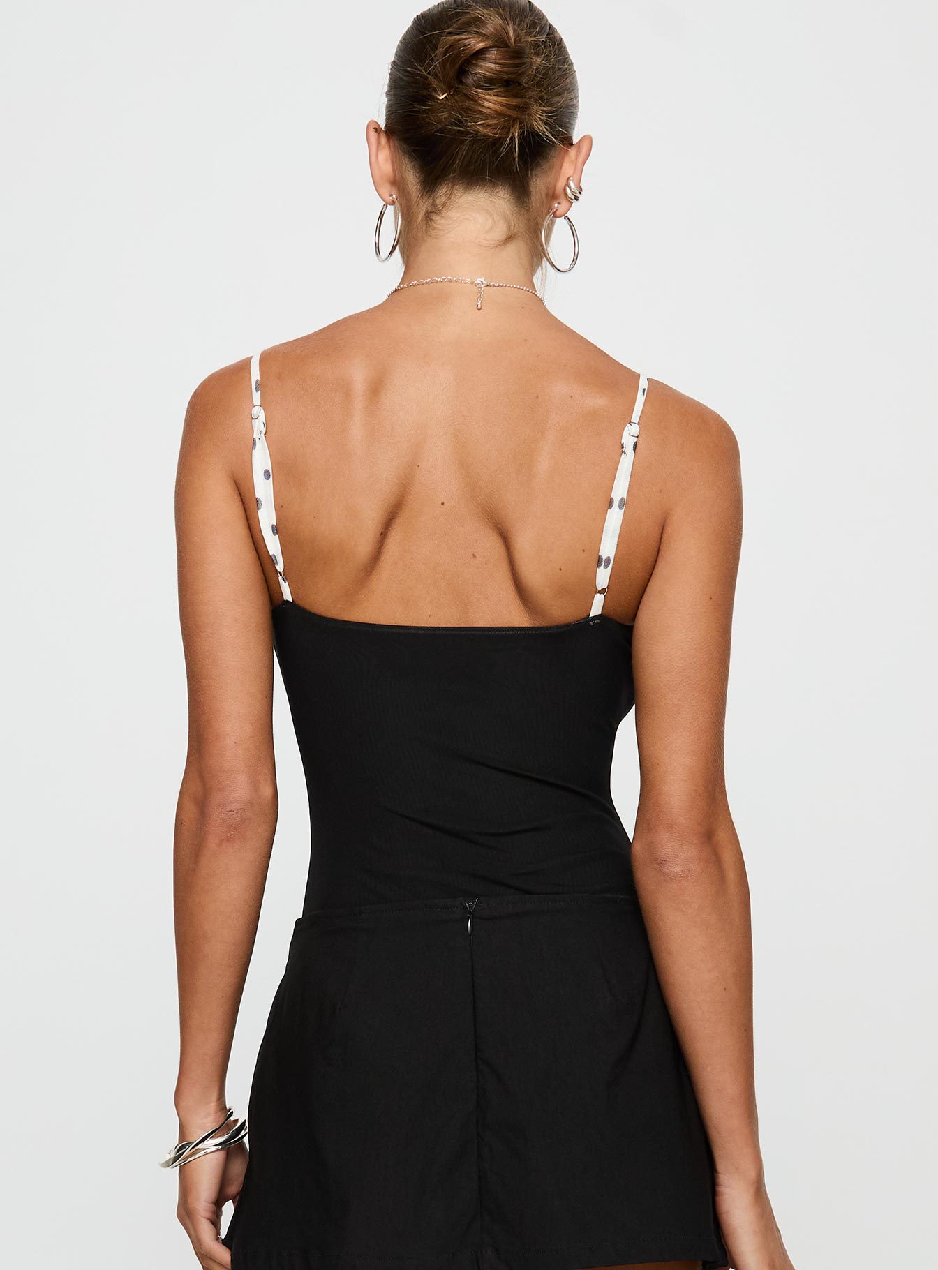 back view of model wearing Princess Polly Evette Bodysuit Black / White Sleeveless 