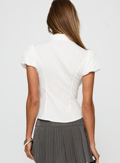 back view of model wearing Princess Polly Academia Puff Sleeve Top White Short Sleeves V-Neck 