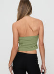 back view of model wearing Princess Polly Catalyst Asymmetrical Top Green Sleeveless Asymmetric Neckline 