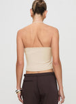 back view of model wearing Princess Polly Catalyst Asymmetrical Top Cream Sleeveless Asymmetric Neckline 