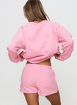 back view of model wearing Princess Polly Princess Polly Sweat Short Bubble Text Pink / Red High Waisted Shorts 