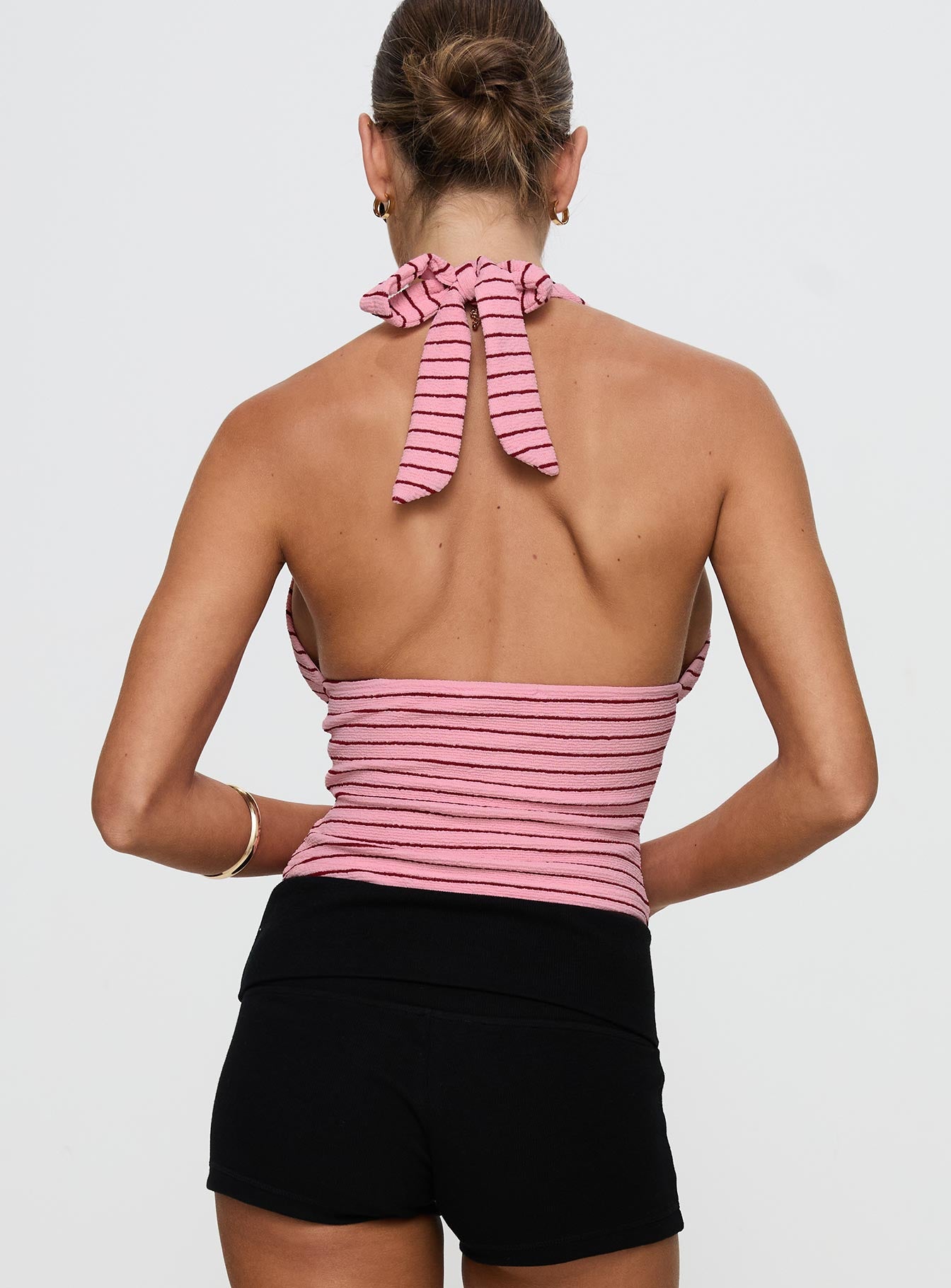 back view of model wearing Princess Polly Whimsy Halter Top Pink / Red Stripe Sleeveless Plunger 