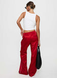 back view of model wearing Princess Polly Travalta Satin Track Pant Red Low Rise Pants 