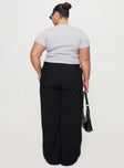 back view of model wearing Princess Polly Sallon Low Rise Pants Black Low Rise Pants 