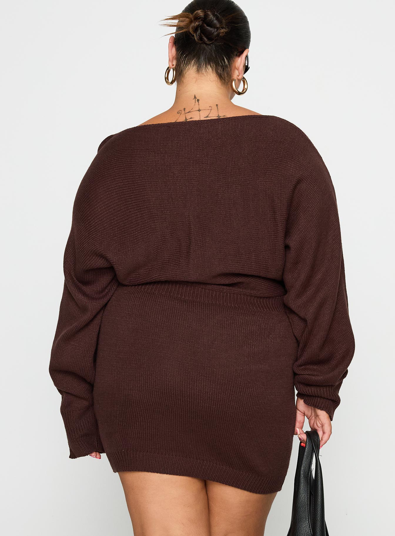 back view of model wearing Princess Polly Bellamie Long Sleeve Mini Dress Chocolate Curve Boat Neck 