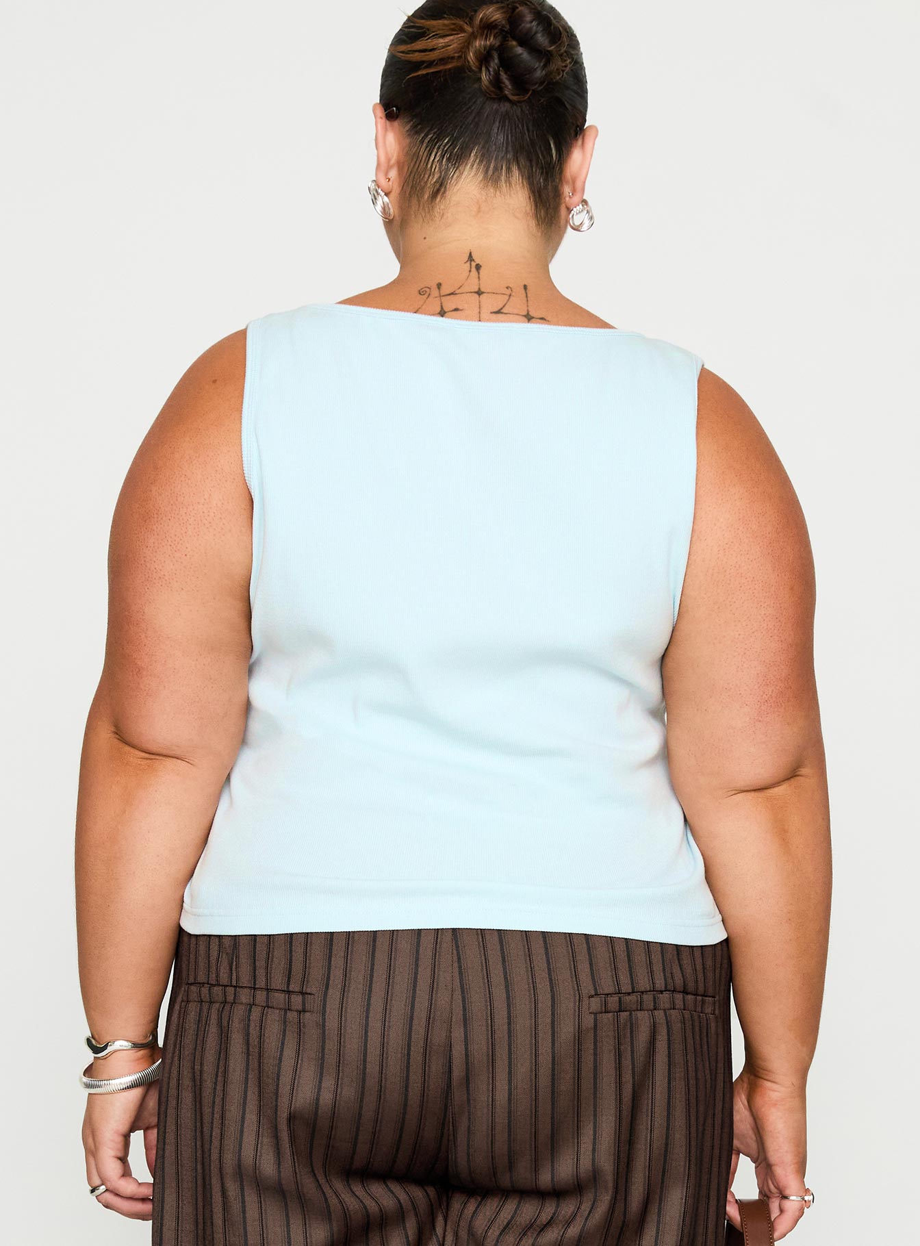 back view of model wearing Princess Polly Baseline Square Neck Rib Tank Top Light Blue Curve Sleeveless Square Neck 