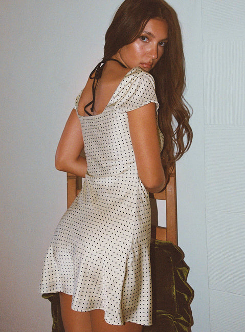 back view of model wearing Princess Polly Lucienna Polka Dot Mini Dress White / Black Petite Scoop Neck 