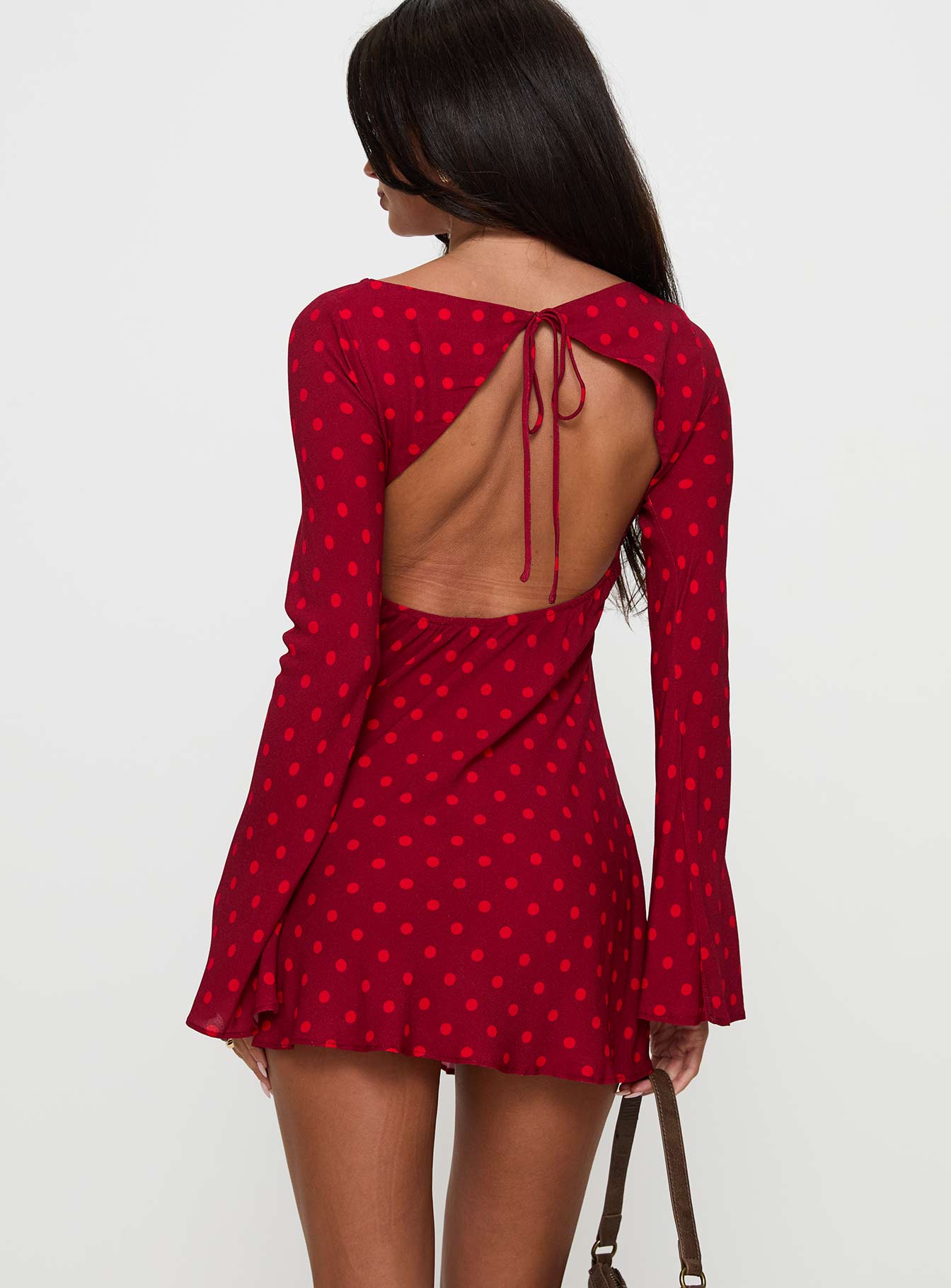 back view of model wearing Princess Polly Good Graces Long Sleeve Mini Dress Red Dot Boat Neck 