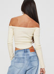 Knit long-sleeve top Off-the-shoulder, crop style, faux button detail down front 
