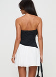 back view of model wearing Princess Polly Amandla Strapless Mini Dress Black / White Sweetheart Neckline 