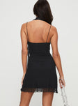 back view of model wearing Princess Polly Infatuation Ruffle Mini Dress Black Square Neck 