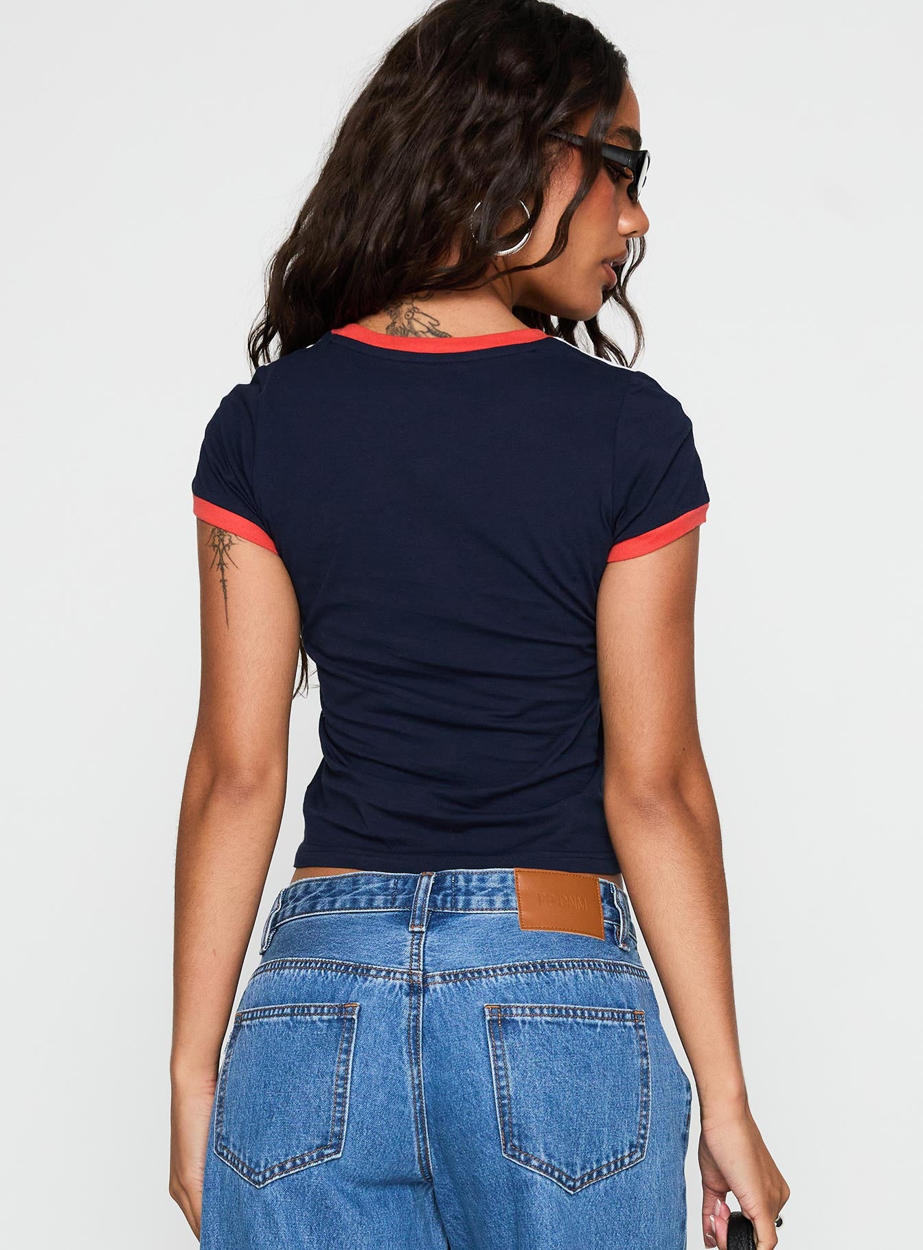back view of model wearing Princess Polly So Brooklyn Graphic Tee Blue Short Sleeves Crew Neck 