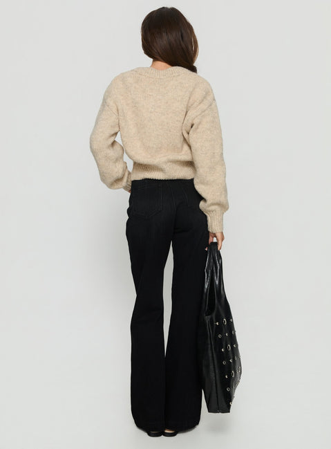 back view of model wearing Princess Polly Slow Ride Mid Rise Bootleg Belted Jeans Washed Black Mid Rise Jeans 