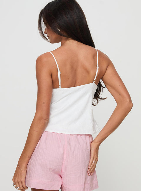 back view of model wearing Princess Polly Astraia Top White Sleeveless Plunger 