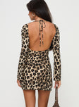 back view of model wearing Princess Polly Carnal Mini Dress Leopard Boat Neck 