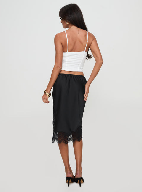 back view of model wearing Princess Polly Gervais Satin Midi Skirt Black Midi Skirts 