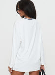 back view of model wearing Princess Polly Star Player Long Sleeve Top White Full Sleeves V-Neck 