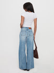 back view of model wearing Princess Polly Ringer Low Rise Wide Leg Jeans Blue Mid Rise 