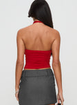 back view of model wearing Princess Polly Lavinea Halter Top Red Sleeveless 