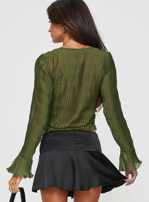 back view of model wearing Princess Polly Kareela Long Sleeve Top Green Full Sleeves V-Neck 