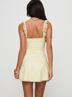 back view of model wearing Princess Polly Beacall Mini Dress Lemon Scoop Neck 