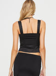 Front view of model wearing  front Princess Polly Sleeveless Square Neck  Chalamet Top Black