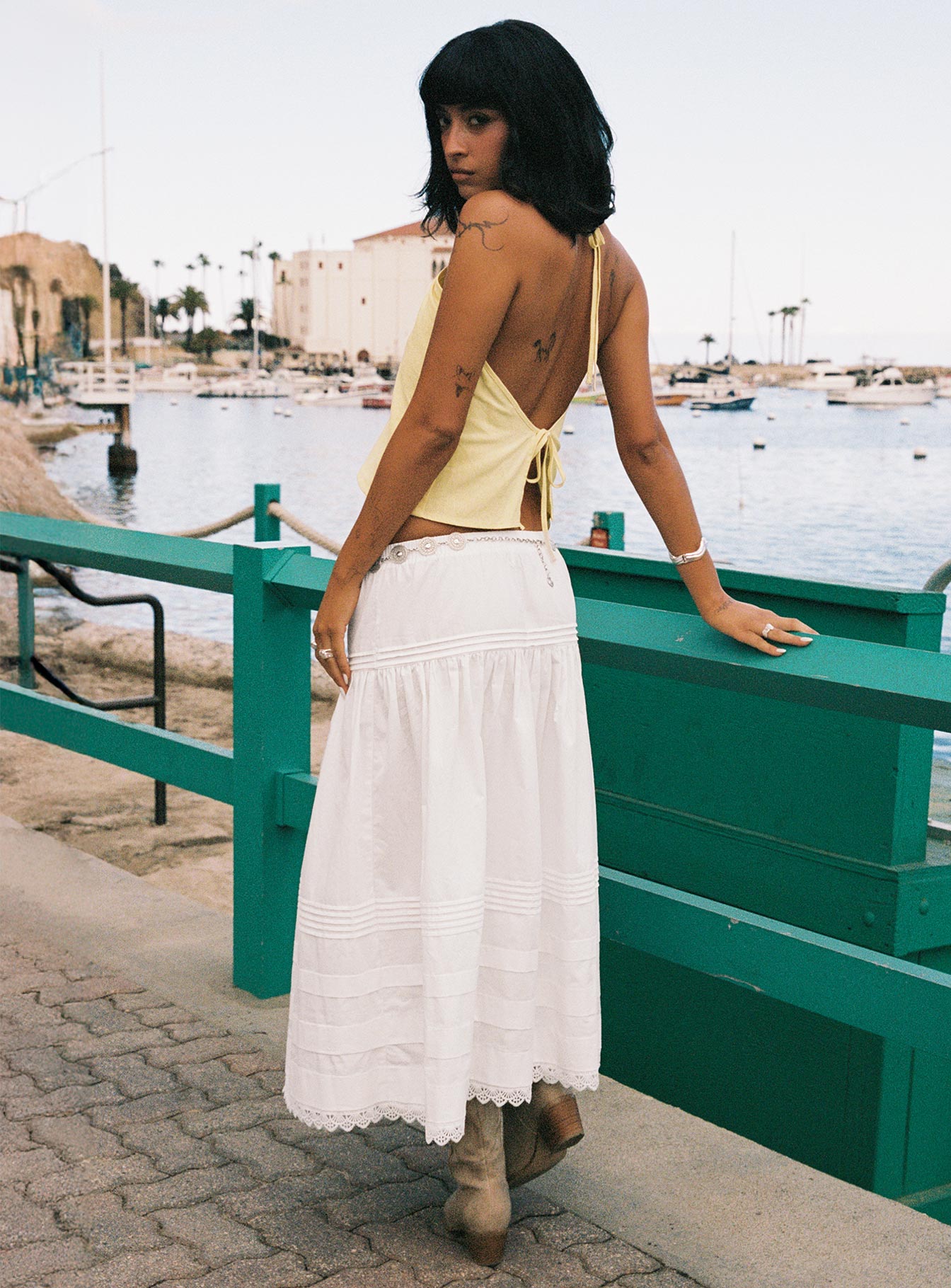 back view of model wearing Princess Polly Calling For You Flowy Maxi Skirt White Maxi 