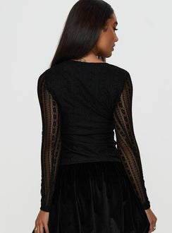 back view of model wearing Princess Polly Worth My Time Tie Neck Cut Out Top Black Full Sleeves High Neck 