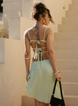 back view of model wearing Princess Polly Pappilion Top Sage Petite Sleeveless Plunger 