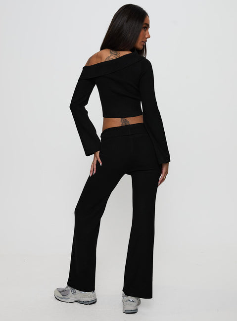 back view of model wearing Princess Polly Try Me Knit Pants Black Low Rise Pants 